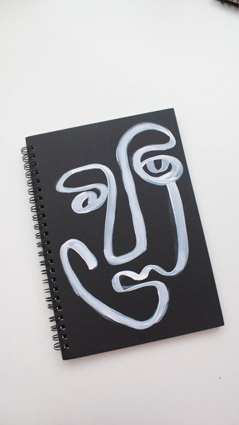 Sencilla Face Notebook